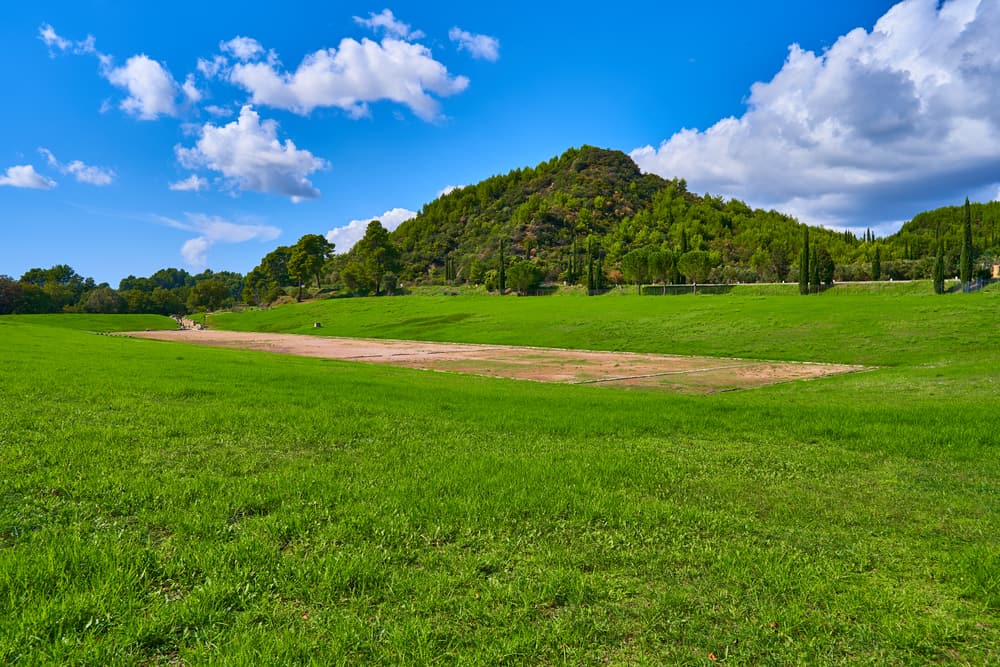 Green grass in the stadium below Kronion hill