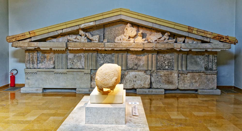 A reconstructed temple pediment on display in the Archaeological Museum of Olympia